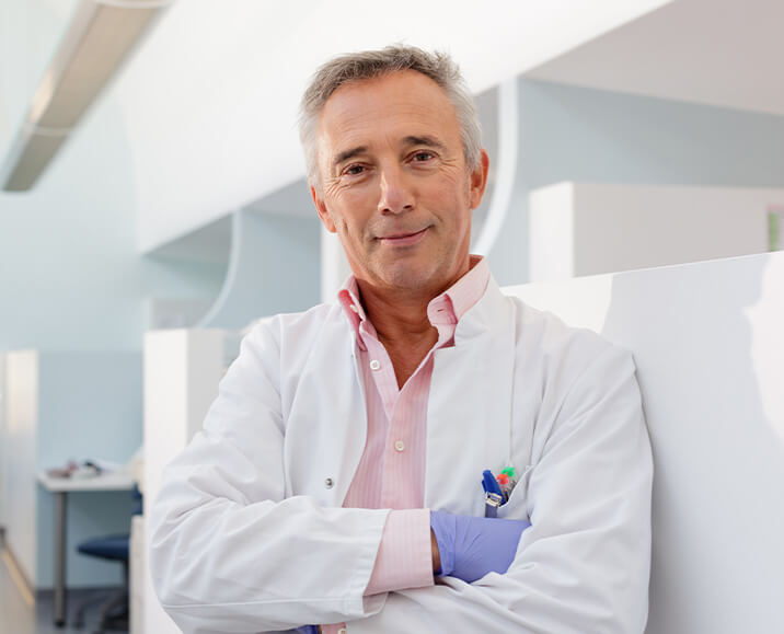 dentist wearing a white lab coat