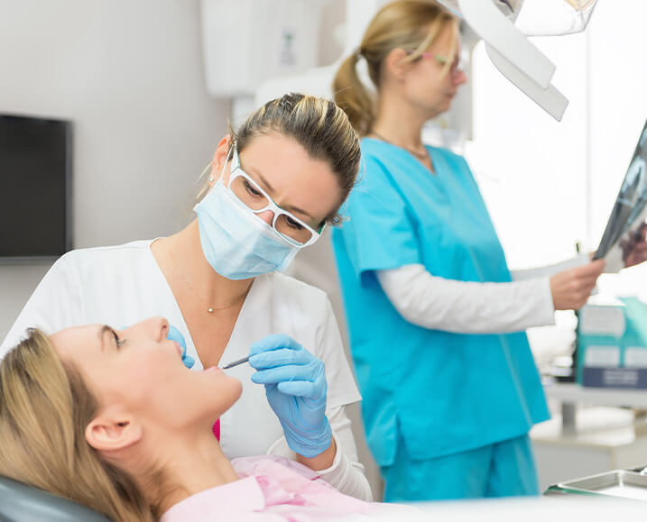 dentist examining a patient's teeth