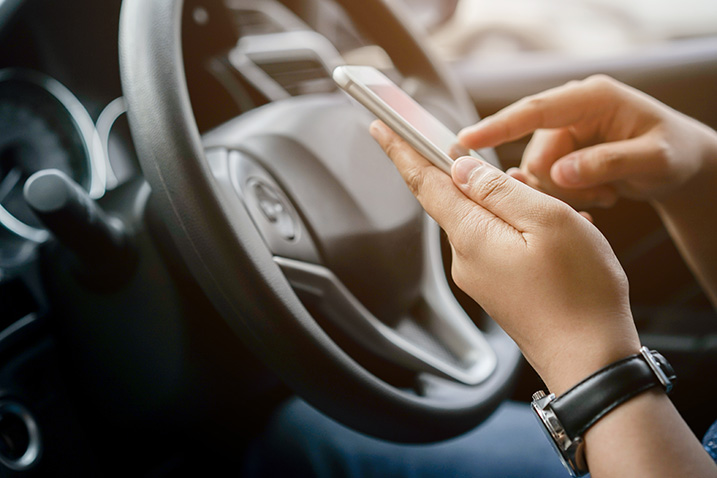 person checking into appointment from their car