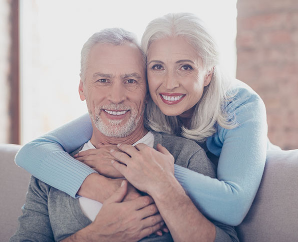 an older couple sitting together