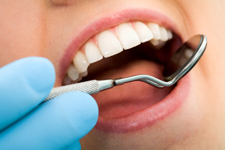 Closeup of a woman with diabetes having her oral health examined at the dentist